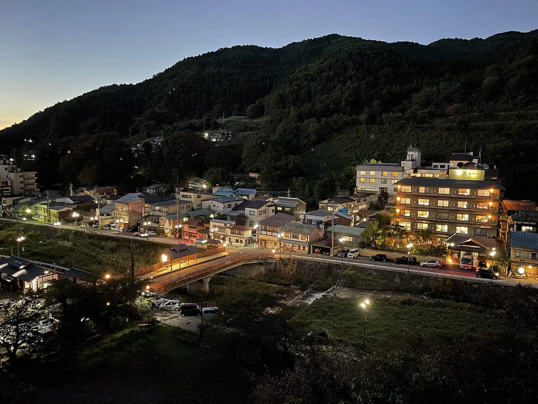 The lantern-lit main lane of Shibu Onsen village at night