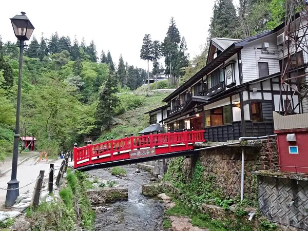 Wooden ryokan facing the Ginzan river at Ginzan Onsen